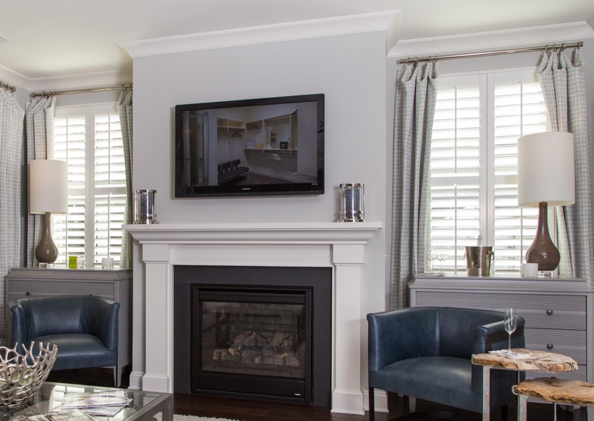 tv room Southern California faux wood shutters